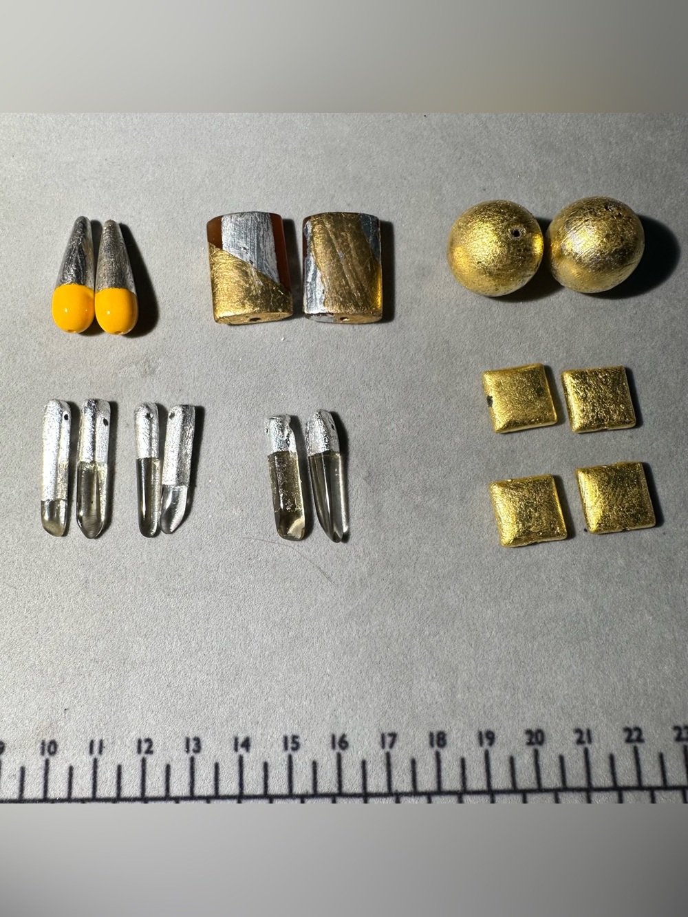 Up cycle stones and plastic beads with silver/gold leafing. Lot of 14 beads.